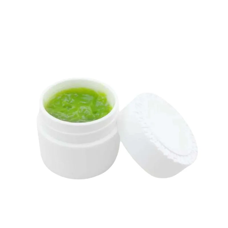 Lash glue remover — Professional beauty product bottle on a table