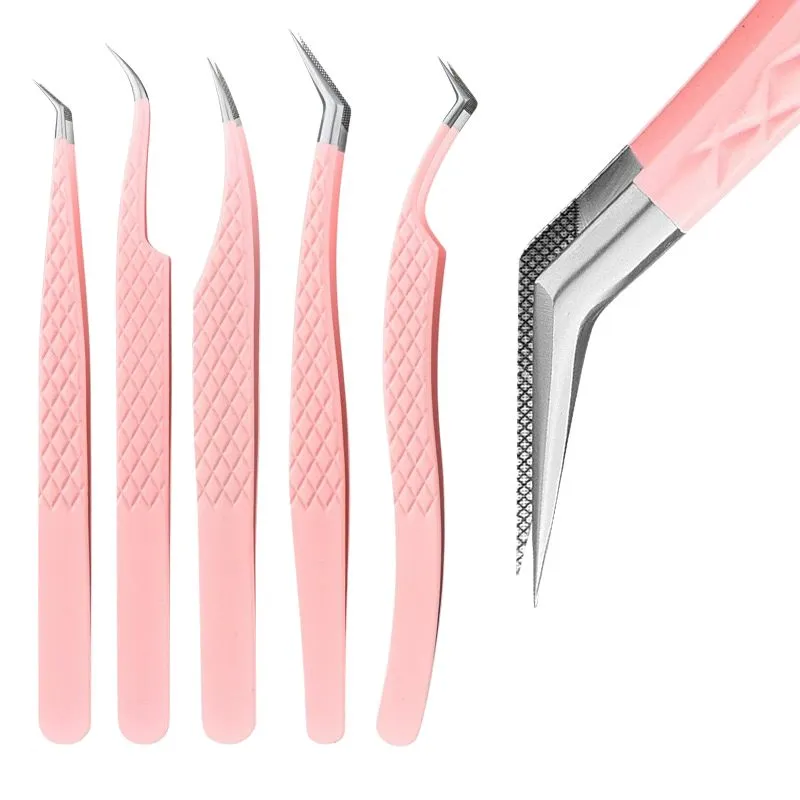 Lash tweezers — Lash technician working close-up with a precision tool