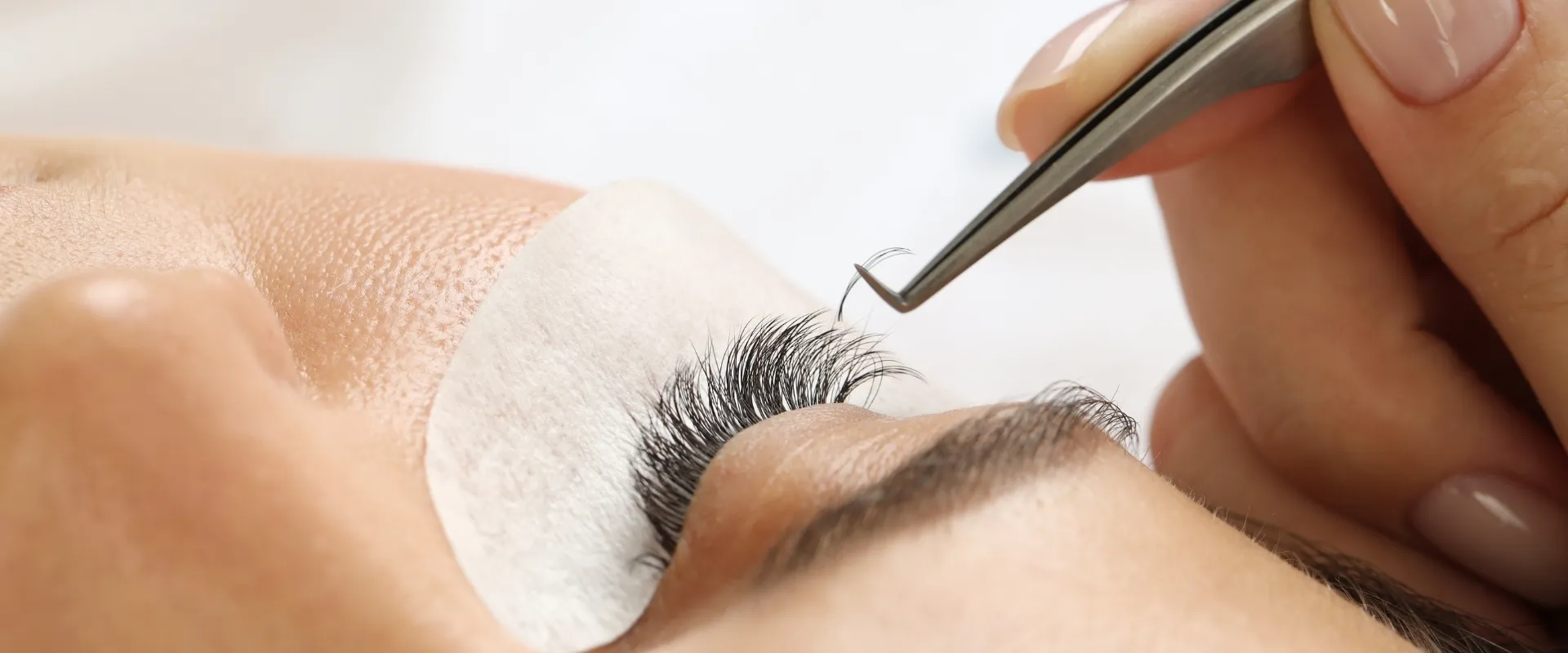 Volume lash extensions — Close-up of an eye showing dense lash extension coverage